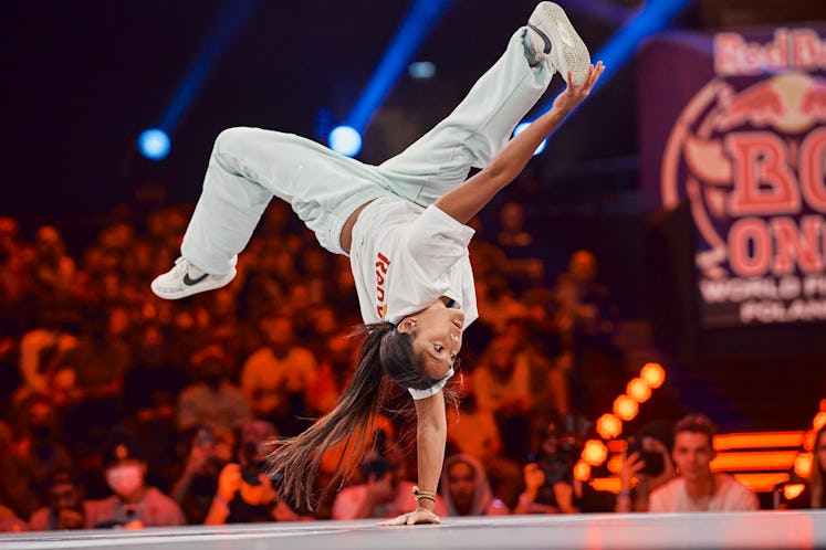 B-girl Logistx does a handstand at the Red Bull BC One Final