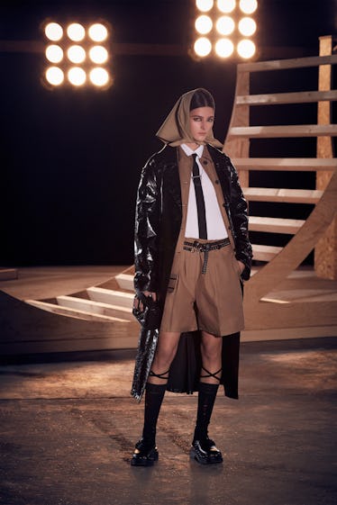 Model wears suit from Dior pre-fall 2022.