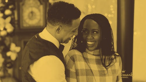 A still of a couple standing close and smiling at each other from Hallmark channel's "Christmas in E...