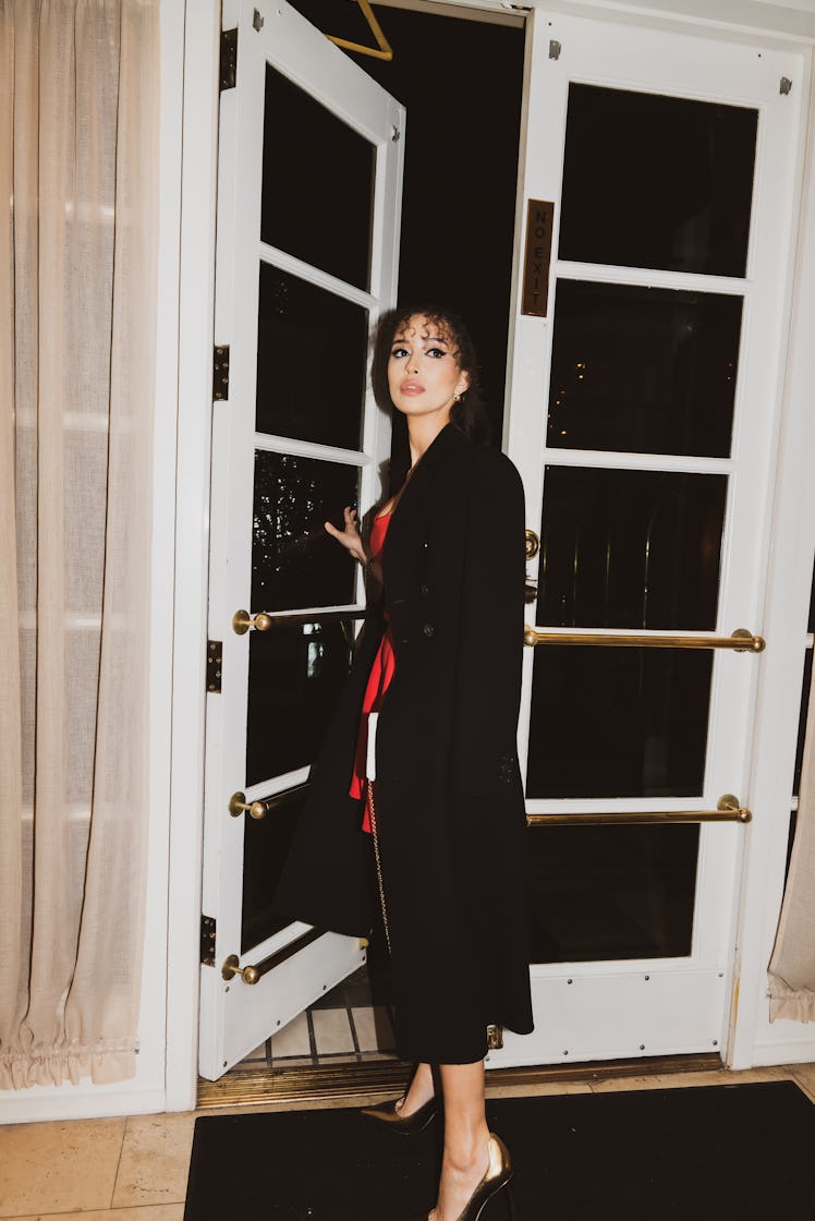 Christian Serratos going to a Dior party 