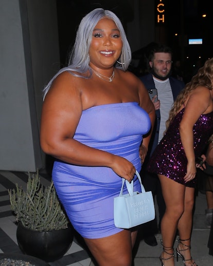 Lizzo carrying CISE bag.