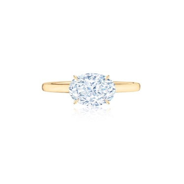 Engagement Ring Set East West With An Oval Diamond in 18K Yellow Gold by Kwiat