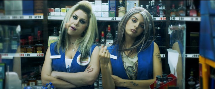 Rebecca Black and Slayyyter in the "Read My Mind" music video