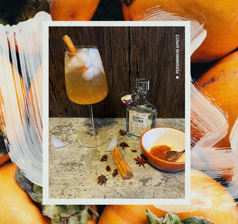 A glass of the Persimmon Holiday rink cocktail, cinnamon sticks, a bowl with jam in it