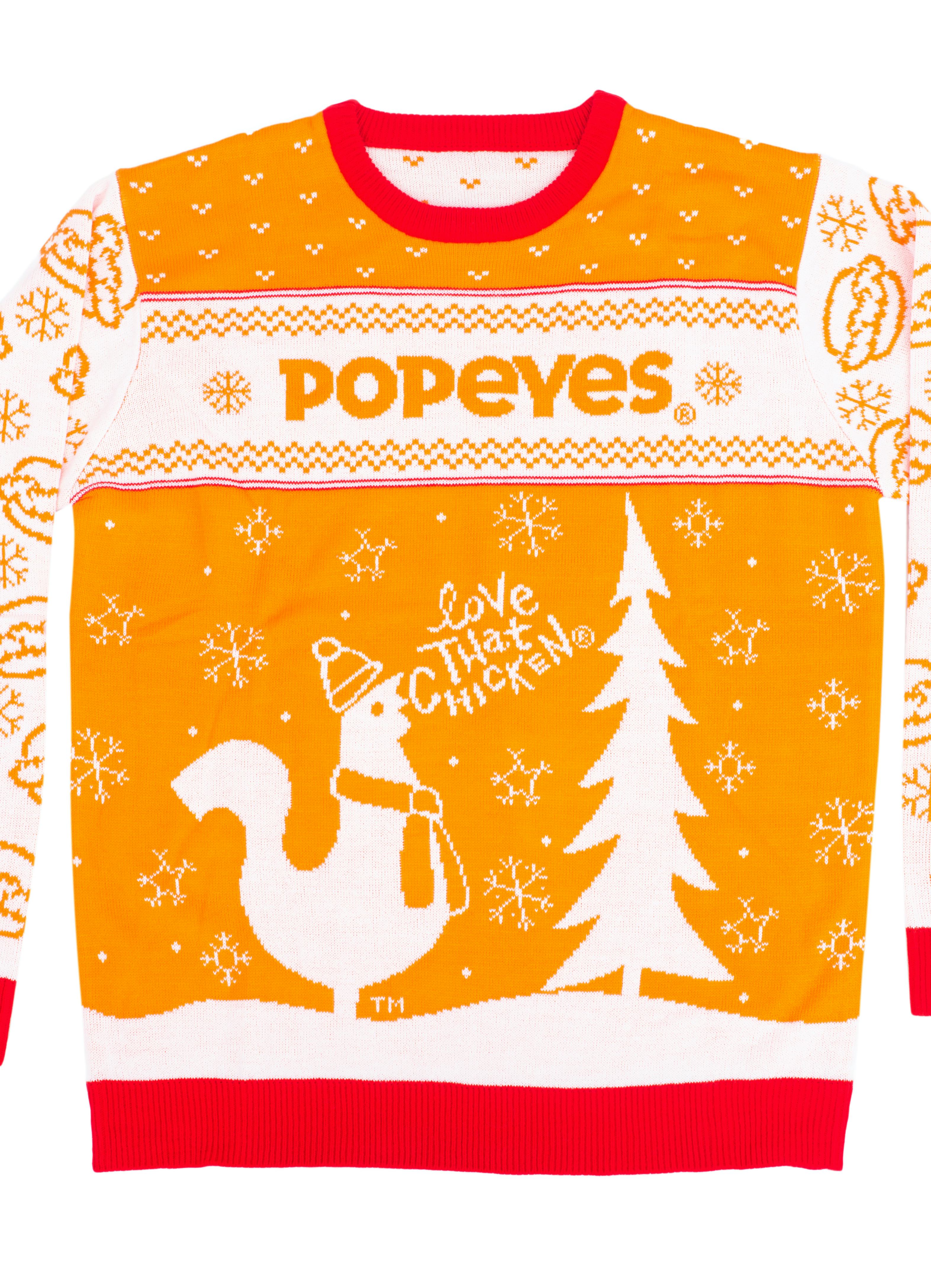 These ugly holiday sweaters for 2021 include options from Popeyes, Franzia, Taco Bell, and more.