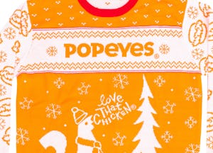 These ugly holiday sweaters for 2021 include options from Popeyes, Franzia, Taco Bell, and more.