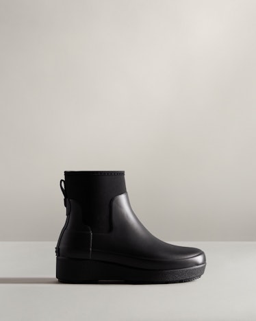 Hunter black rain boots.