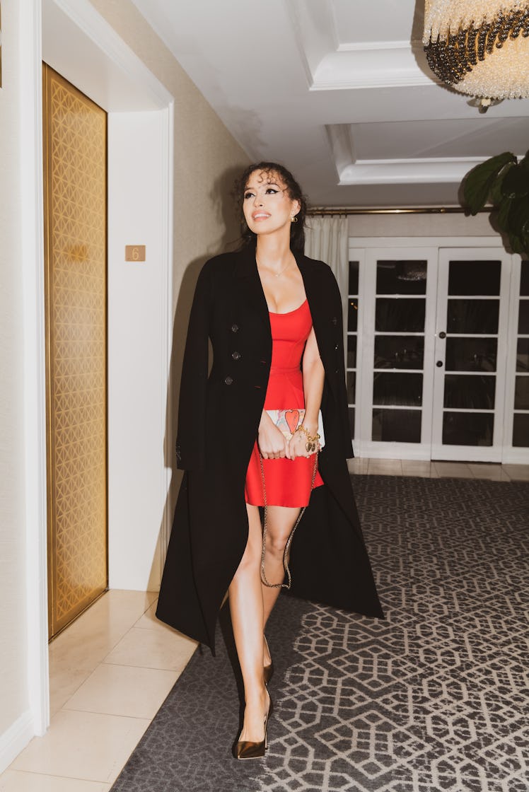 Christian Serratos in a red dress