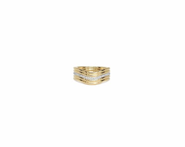 A yellow gold band with diamonds by Almasika