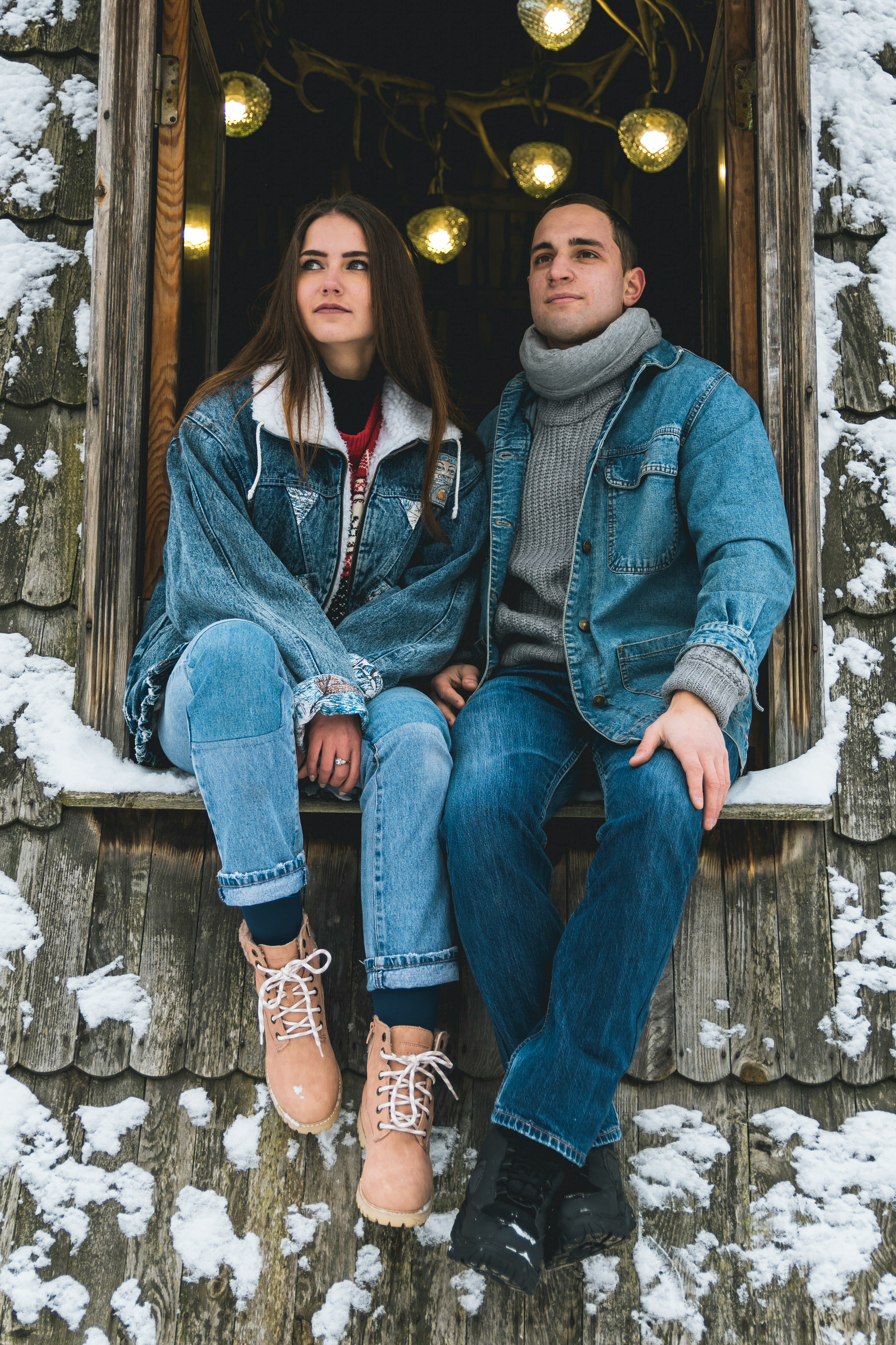 Young couple in a winter cabin on January 8, 2022, the most romantic day of the month for their zodi...