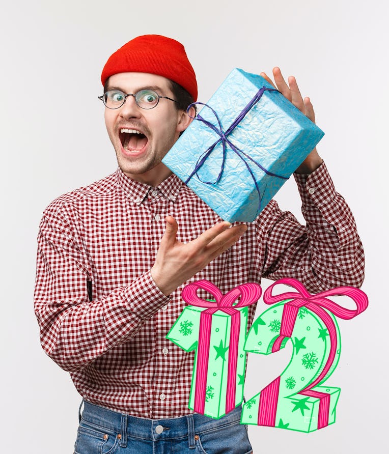 Waist-up portrait excited happy young funny guy receive b-day gifts, shaking wrapped box as trying g...