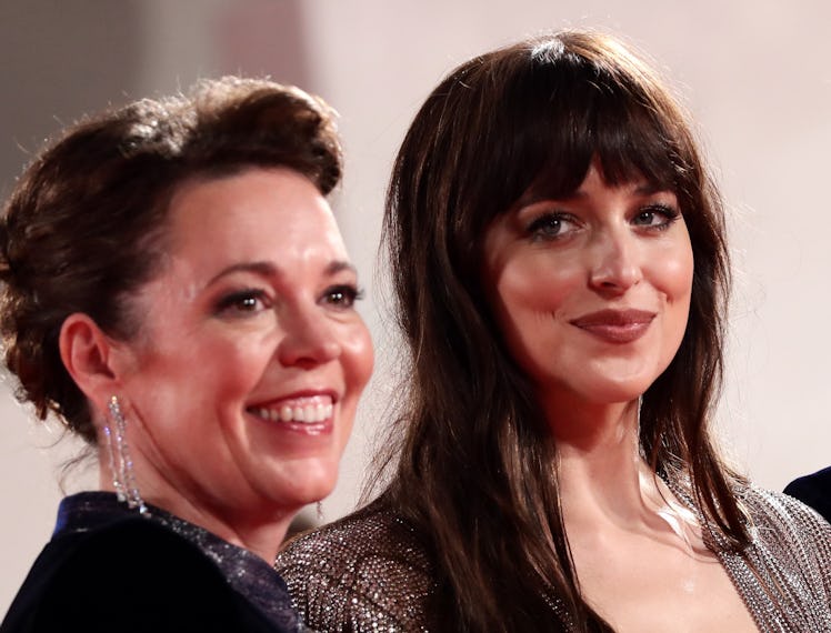 Olivia Colman and Dakota Johnson smiling
