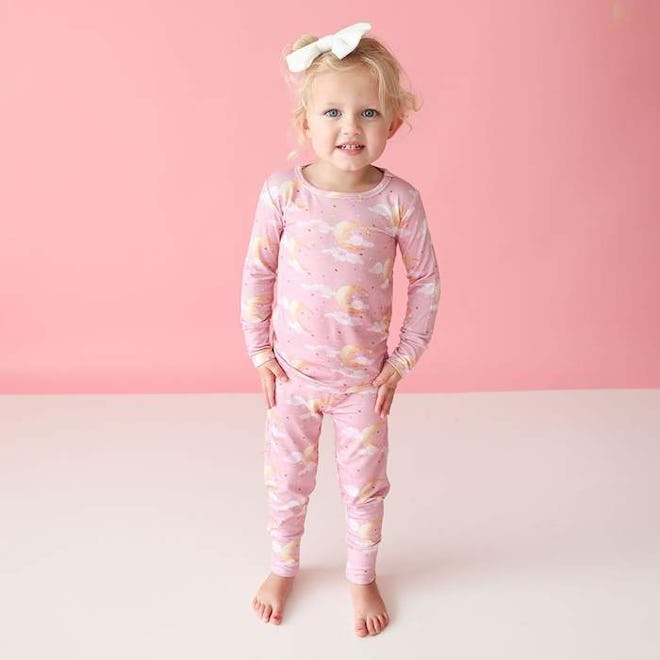 Little girl modeling kids pajamas set