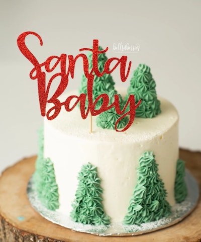 Christmas cake with "Santa Baby" cake topper