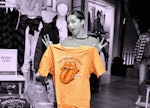 Addison Rae holding a Rolling Stones T-shirt as part of her go-to Christmas 2021 outfit from America...