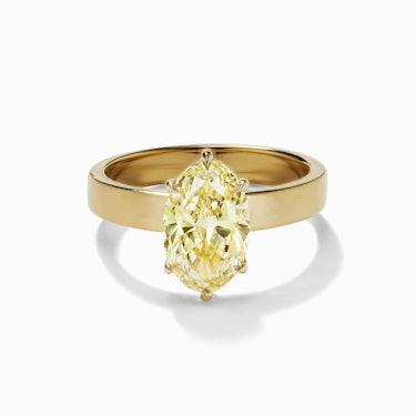 A fancy light brownish yellow oval engagement ring by Aaryah