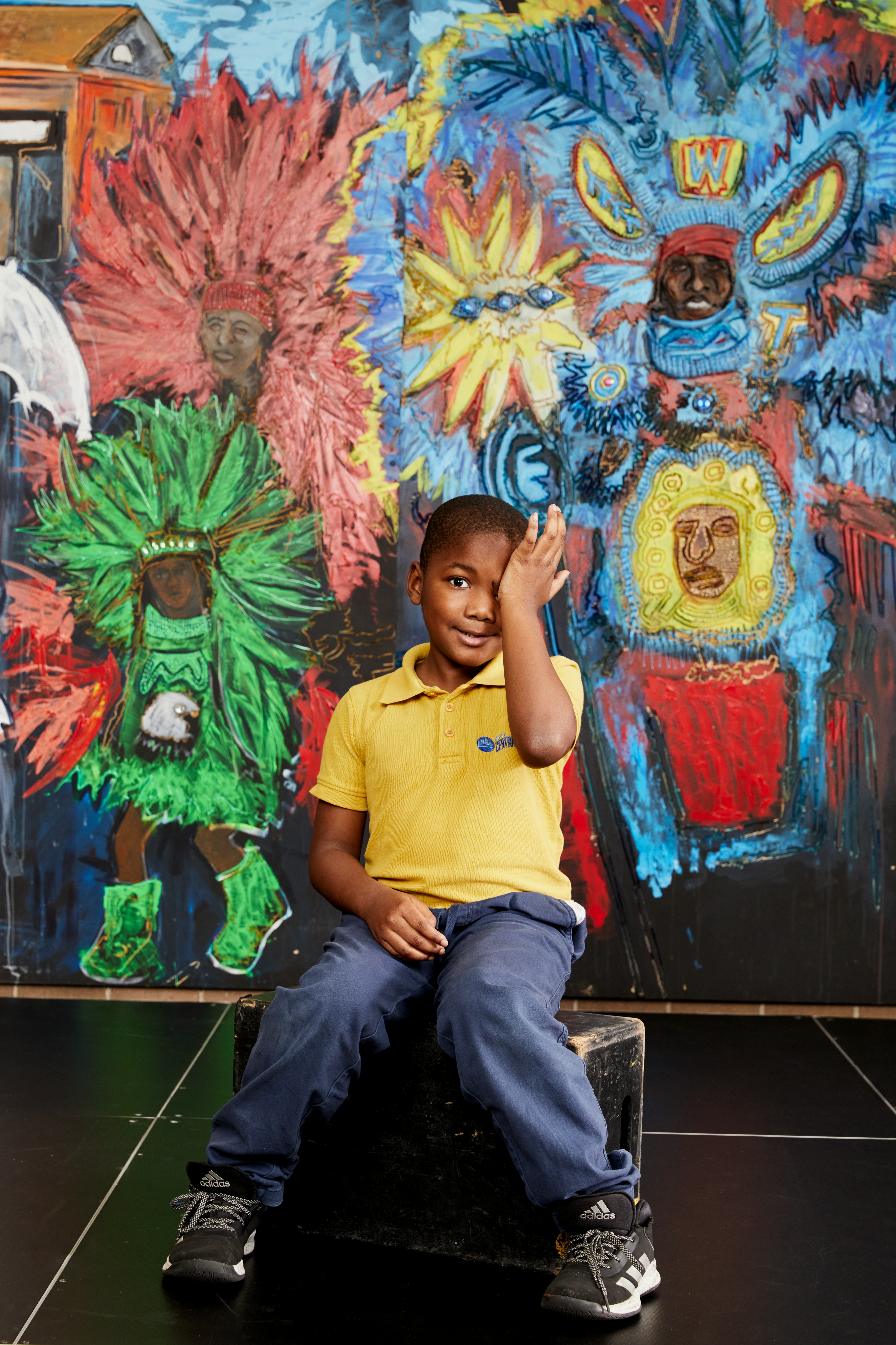 A young kid waiting to get his vaccine