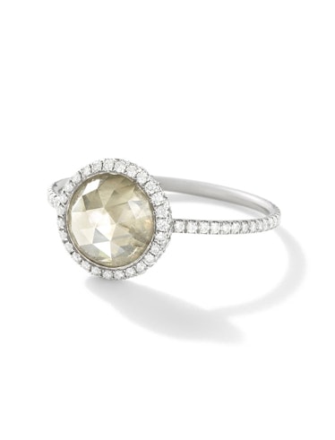 A round grey diamond ring by Monique Péan  featuring white diamond pavé in recycled platinum 