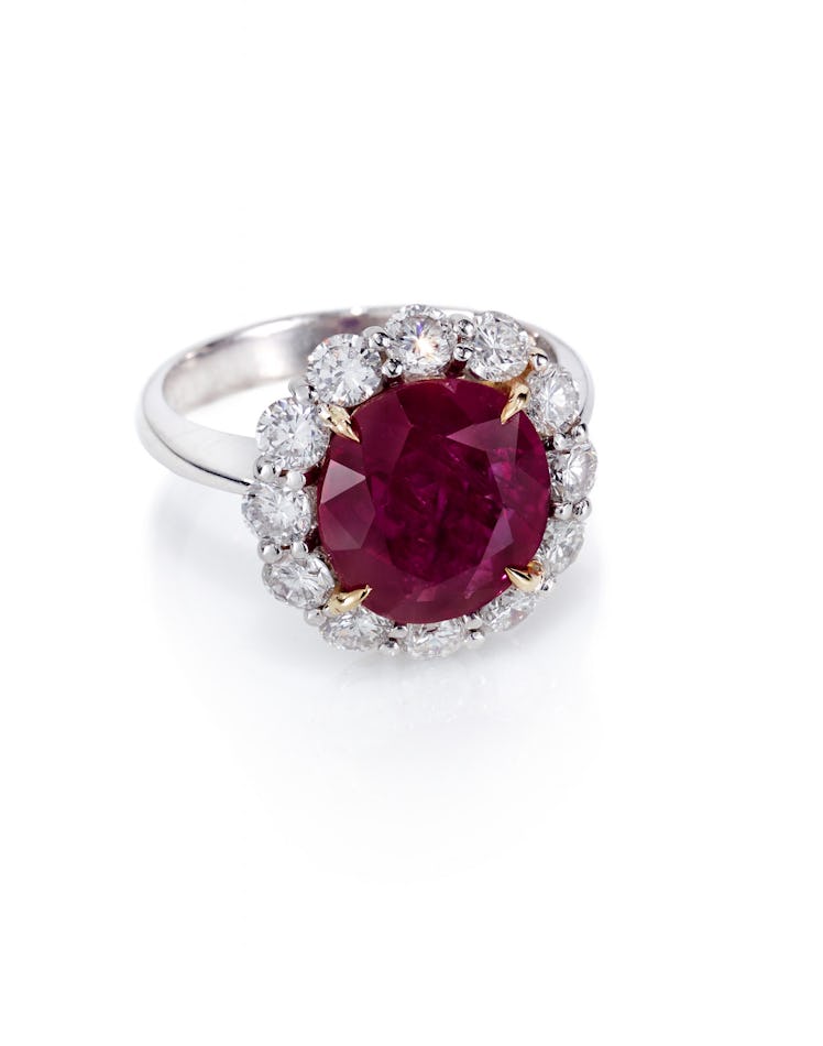 A ruby and diamond cluster ring by Lauren Addison