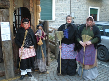 Women dressed like La Befana in Italy