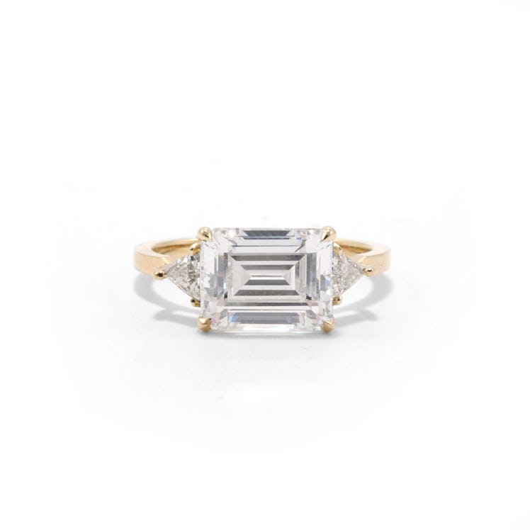 An emerald cut engagement ring by Ashley Zhang
