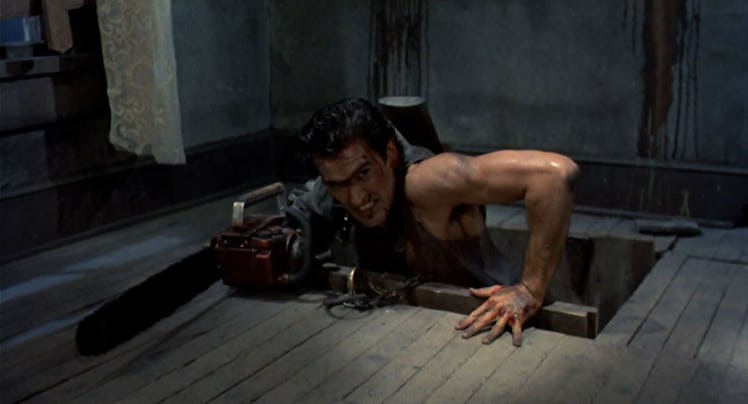 Bruce Campbell entering a floor in "Evil Dead 2"