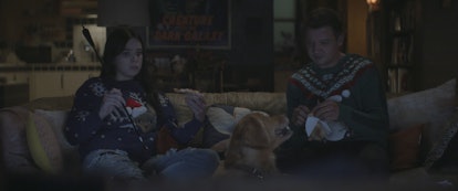 Hailee Steinfeld as Kate Bishop and Jeremy Renner as Clint Barton watching Christmas movies in Disne...