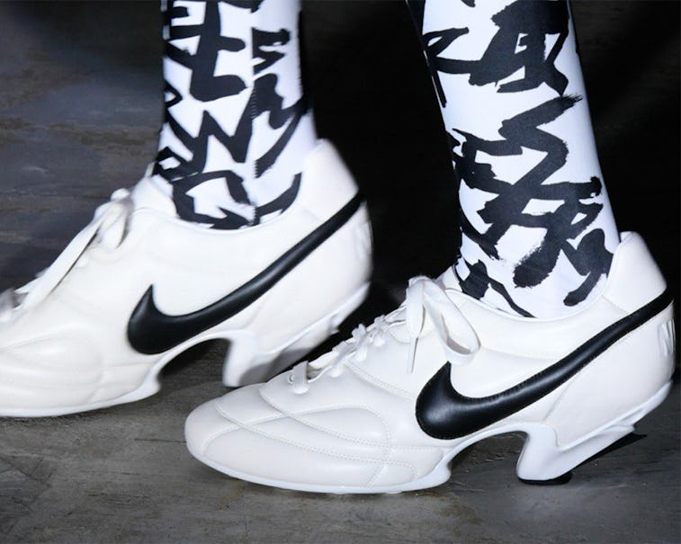 Nike s Comme des Gar ons heels look like weirdly tall soccer shoes