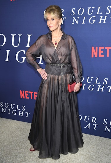 Jane Fonda wearing a sheer grey dress 