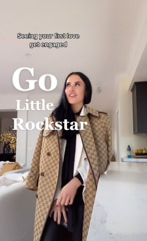 A screenshot of a woman doing the "Go Little Rockstar" viral TikTok trend