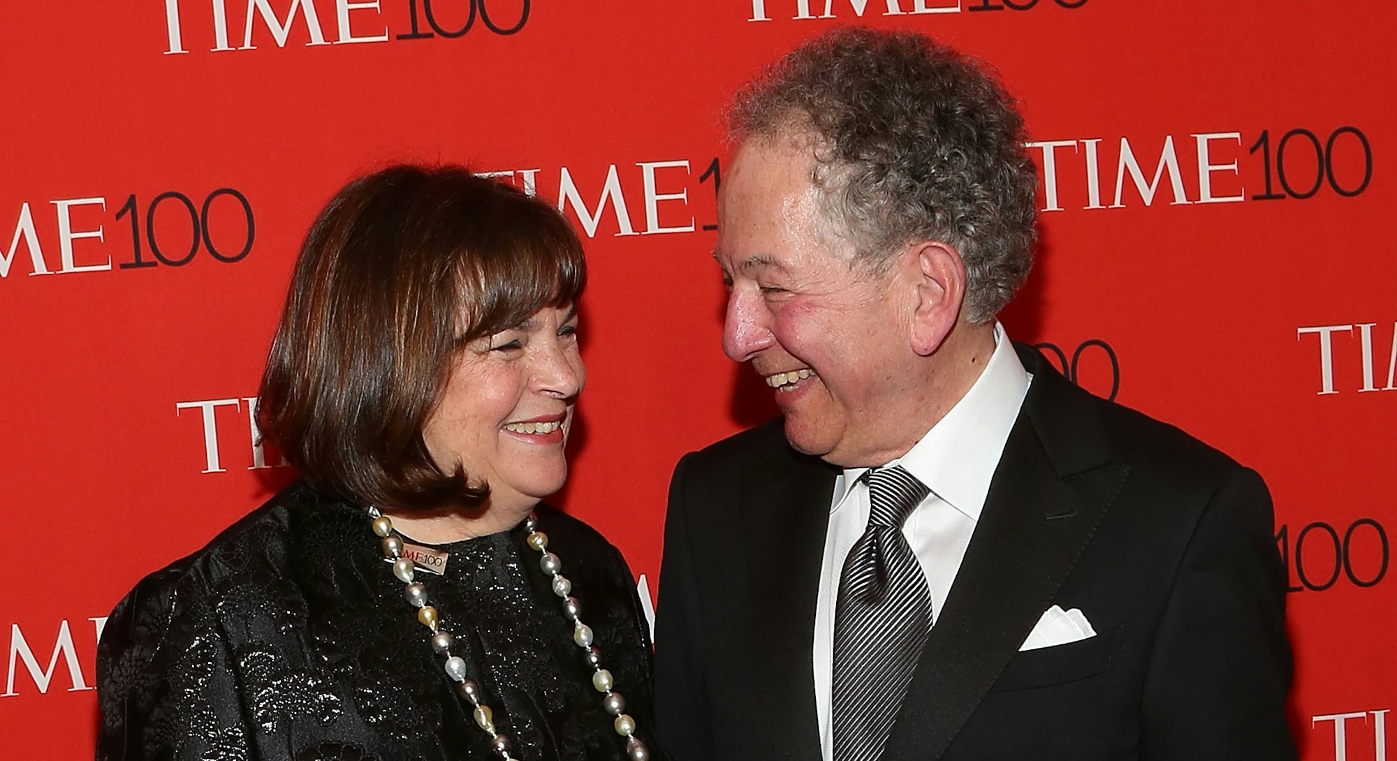 Ina Garten and Husband Jeffrey Garten smiling at each other at the time 100 gala