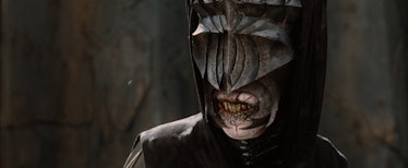 The Mouth of Sauron looking at Gandalf in Lord of the Rings: Return of the King