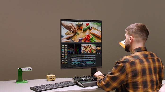 Man using LG's DualUp 28MQ780 monitor