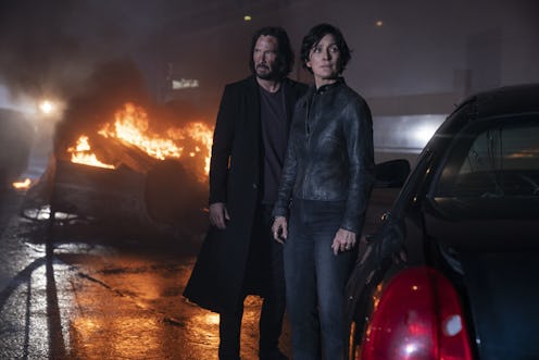 Keanu Reeves as Neo and Carrie-Anne Moss as Trinity in 'The Matrix Resurrections.'