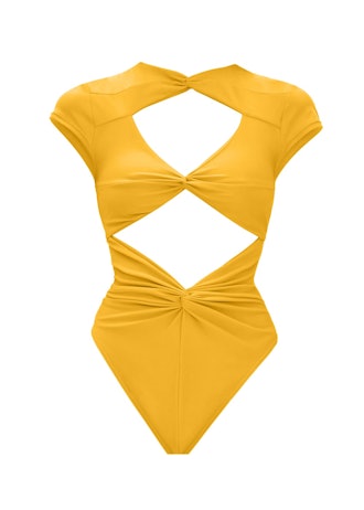 Andrea Iyamah yellow one-piece swimsuit.