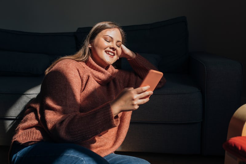 Woman looking at her phone.