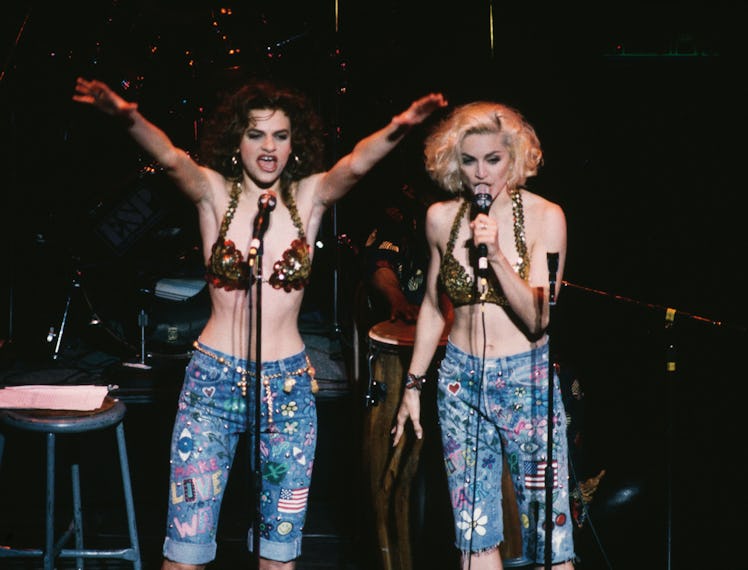 Madonna and actress Sandra Bernhard (left) perform at the Don't Bungle the Jungle benefit concert