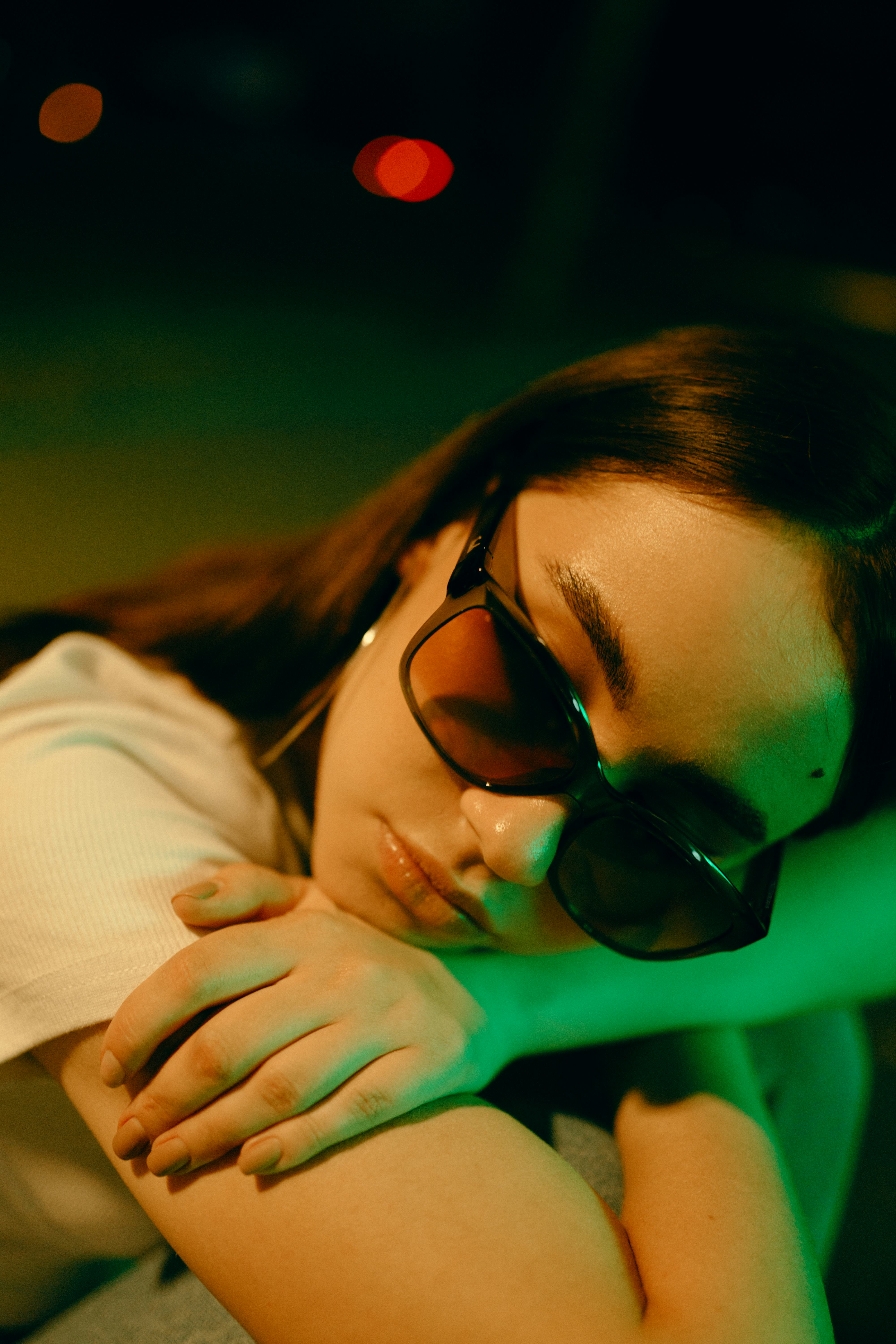 Young woman sad and holding back tears as one of the zodiac signs most likely to cry on Christmas 20...