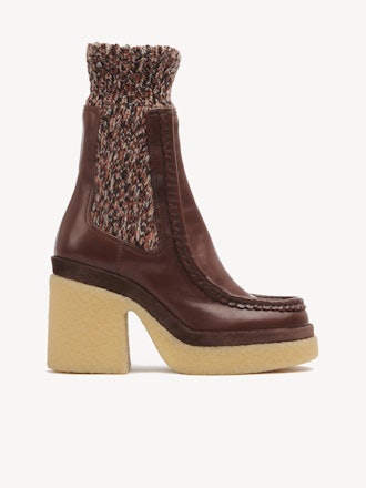 A brown leather sock boot by Chloe