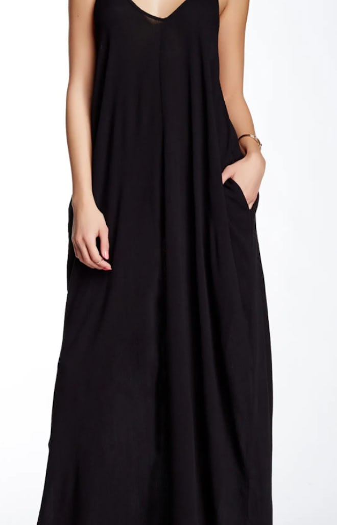 model wearing black, flowy, maxi dress