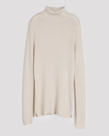 Unsubscribed beige turtleneck sweater.