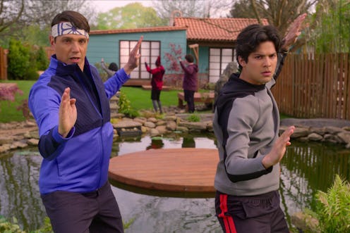 Ralph Macchio as Daniel LaRusso, Xolo Maridueña as Miguel Diaz in Cobra Kai. 