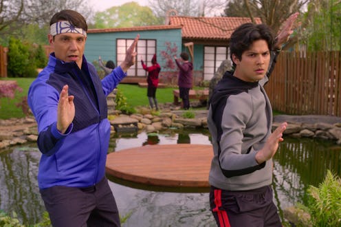 Ralph Macchio as Daniel LaRusso, Xolo Maridueña as Miguel Diaz in Cobra Kai.