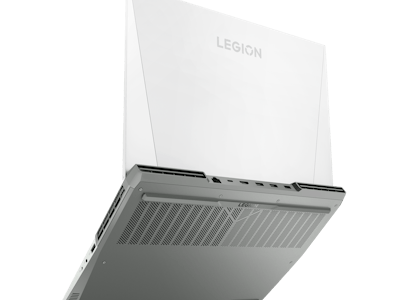 The Lenovo Legion 5 Pro laptop in white facing away with cover and bottom vents visible
