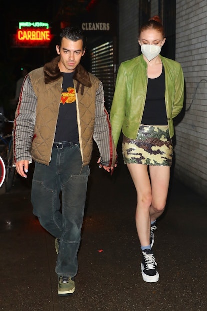 Sophie Turner wears sequin camo miniskirt, 2021.