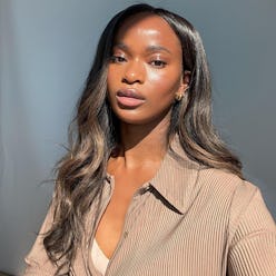 woman with strong cheekbones and glowy skin