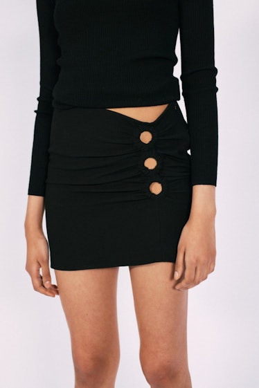 Musier Paris black mini skirt.