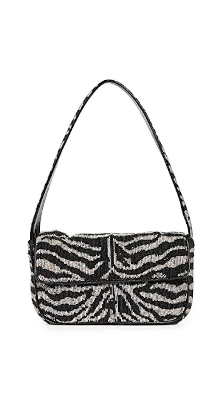 STAUD Tommy Bag in a black and white zebra print. 