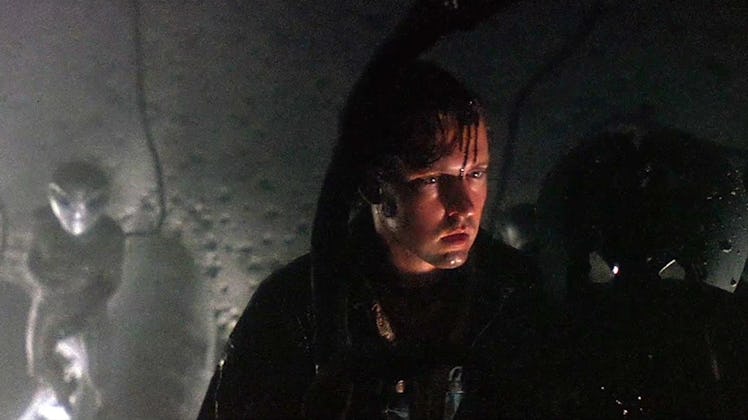 Travis Walton (D.B. Sweeney) is abducted by aliens in Fire in the Sky.