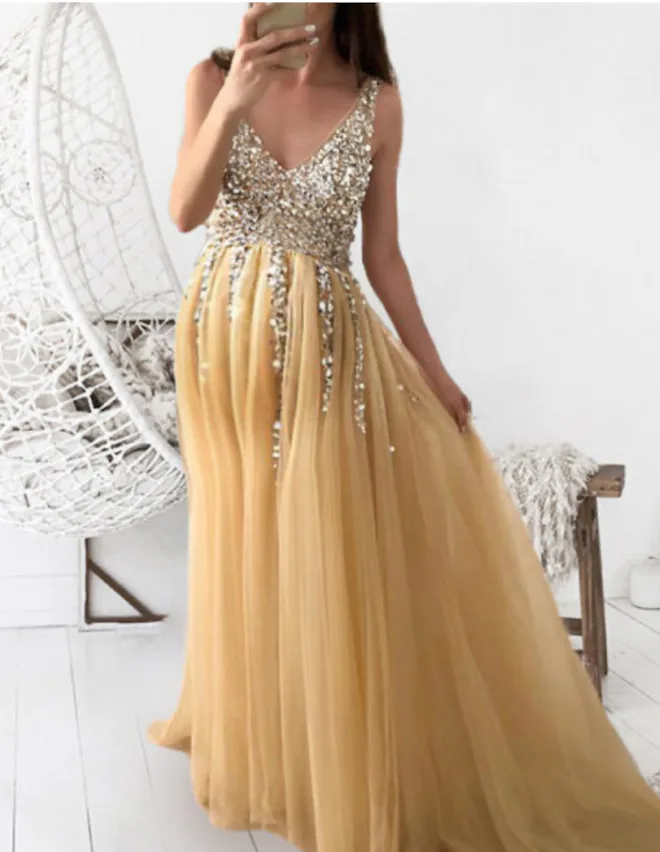 10 Sparkly Gold Maternity Dresses For Weddings, Parties, & More 10 Sparkly Gold Maternity Dresses For Weddings, Parties, & More